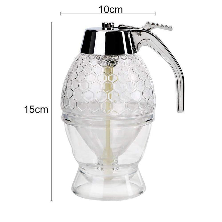 "Multifunktionell smidig honungsdispenser i glas med kromdetaljer för köket, eliminerar spill och klibbighet."