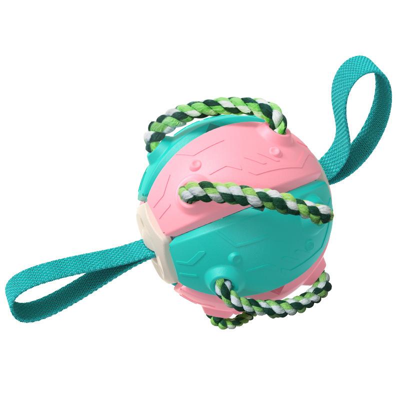 "Multifunktionell tuggig UFO-boll för hundträning med färgglada rep och gummiyta, perfekt för interaktiv lek utomhus."