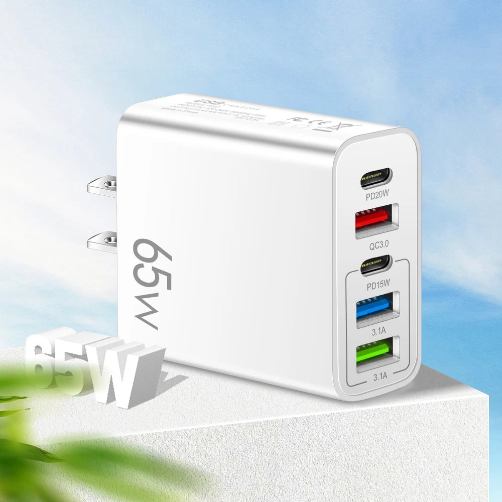 "Multiportadapter 65W snabbladdare, kompakt design, flera USB-portar, laddar flera enheter snabbt och effektivt."