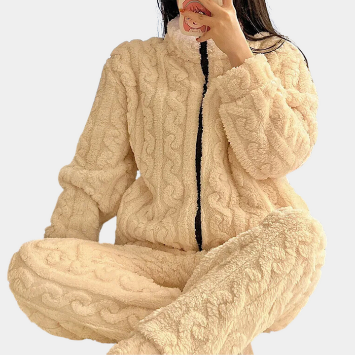 Elegant dam-jumpsuit för vintern, en bekväm och mjuk onesie för både pyjamas och vardagskläder.