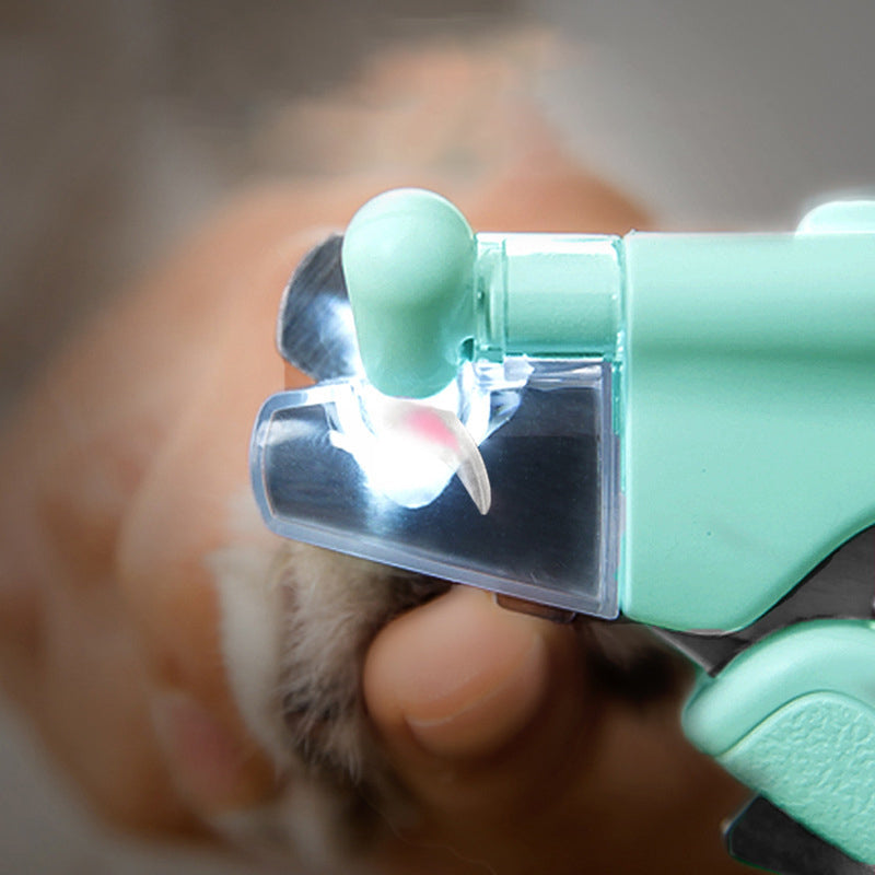 "Nagelklippare för husdjur med LED-ljus, vitt ergonomiskt handtag och inbyggd förvaringslåda, perfekt för säker klippning."