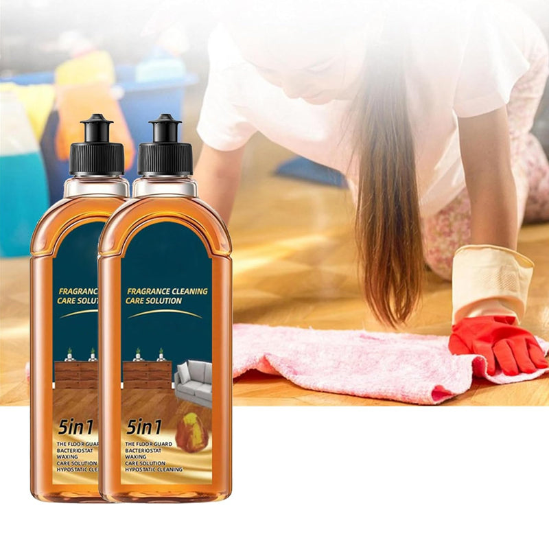 "Naturlig dubbelverkande golvvård 500ml flaska, genomskinlig med grön och blå etikett, rengör och skyddar golv effektivt."