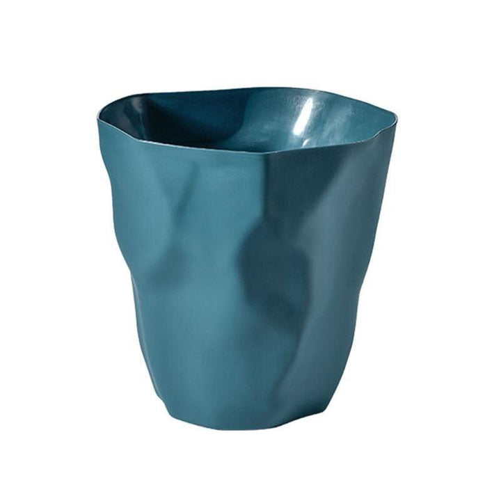 Marinblå oregelbunden soptunna i modern design