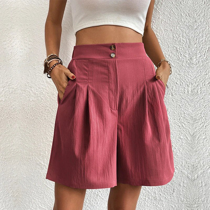 Rosa damshorts med hög midja och praktiska sidofickor