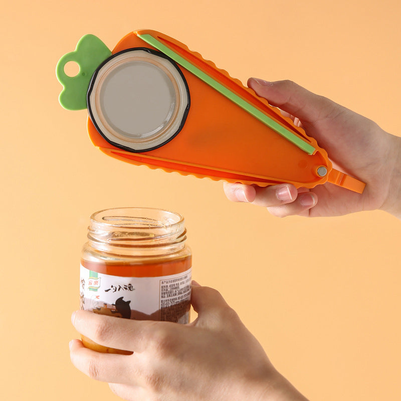 "Orange morotsformad multifunktionell flasköppnare i kök, ABS plast, robust och lekfull design för alla lockstorlekar."