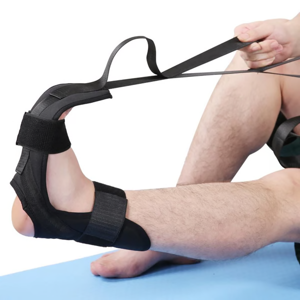 Närbild på fotfäste med kardborreband på yoga stretching strap