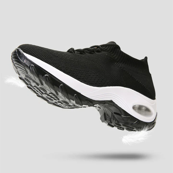 Luftkuddesneakers för dam i trendig färg som kombinerar stil och hälsa.
