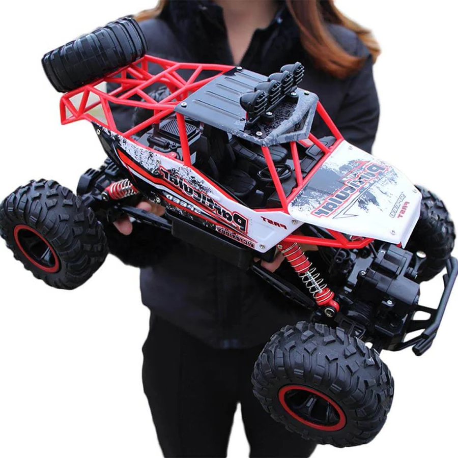 Röd och vit fjärrstyrd monstertruck uppvisad i skala 1 till 12