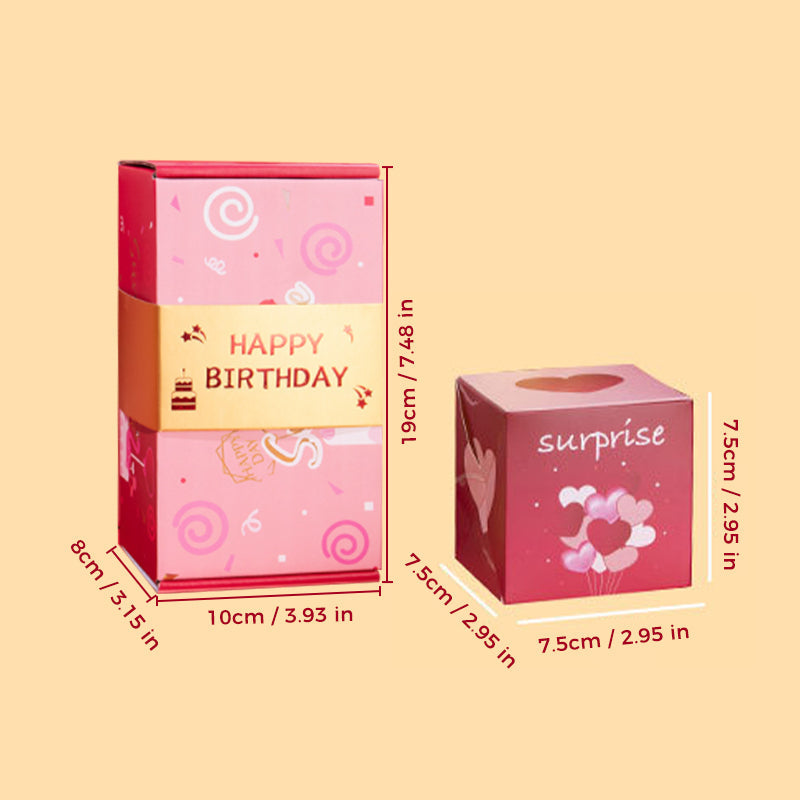 Överraskningspresentask med popup-effekt i glada färger som rosa och gul, perfekt för födelsedagar och fester.
