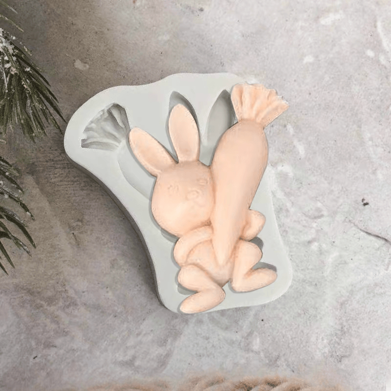 "Påsk 3D bakform i silikon med påsktema: kaniner & ägg i olika former. Perfekt för påskkakor och köksäventyr."