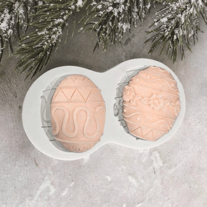 "Påsk 3D bakform i silikon med påsktema: kaniner & ägg i olika former. Perfekt för påskkakor och köksäventyr."