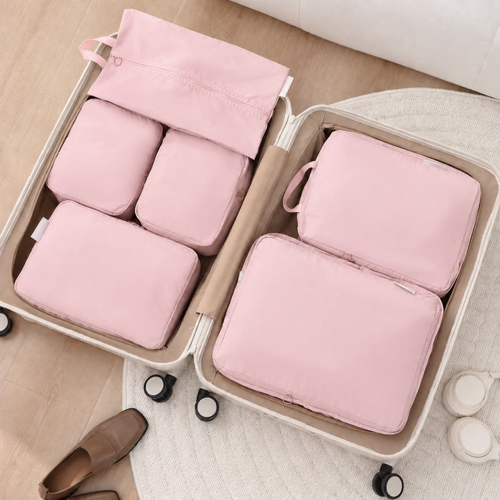 Grå packningskuber och väskorganisatör för effektiv packning på resan