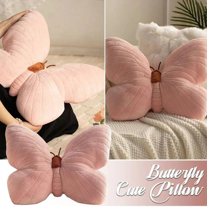 Dekorativ hemtextil i form av en rosa fjäril på bäddad säng