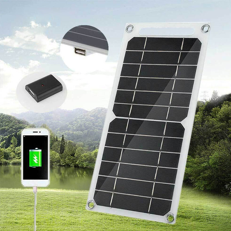 "Portabel 30W solpanel med USB, tunn design, svart yta, sugkoppar för montering, perfekt för utomhusäventyr."