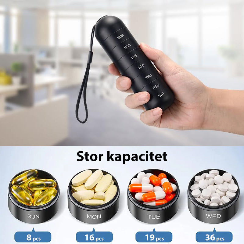 "Portabel pillerask med 7 fack i metallisk finish, vattentät design, perfekt för resor och medicinsk organisering."