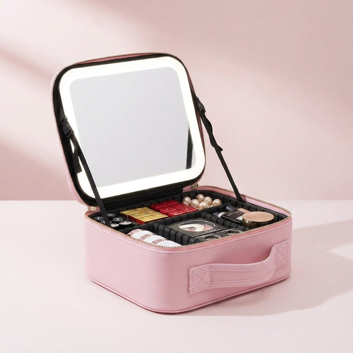 Rosa bärbar sminkstation med LED-spegel och rymlig förvaring. Optimal för on-the-go makeup.