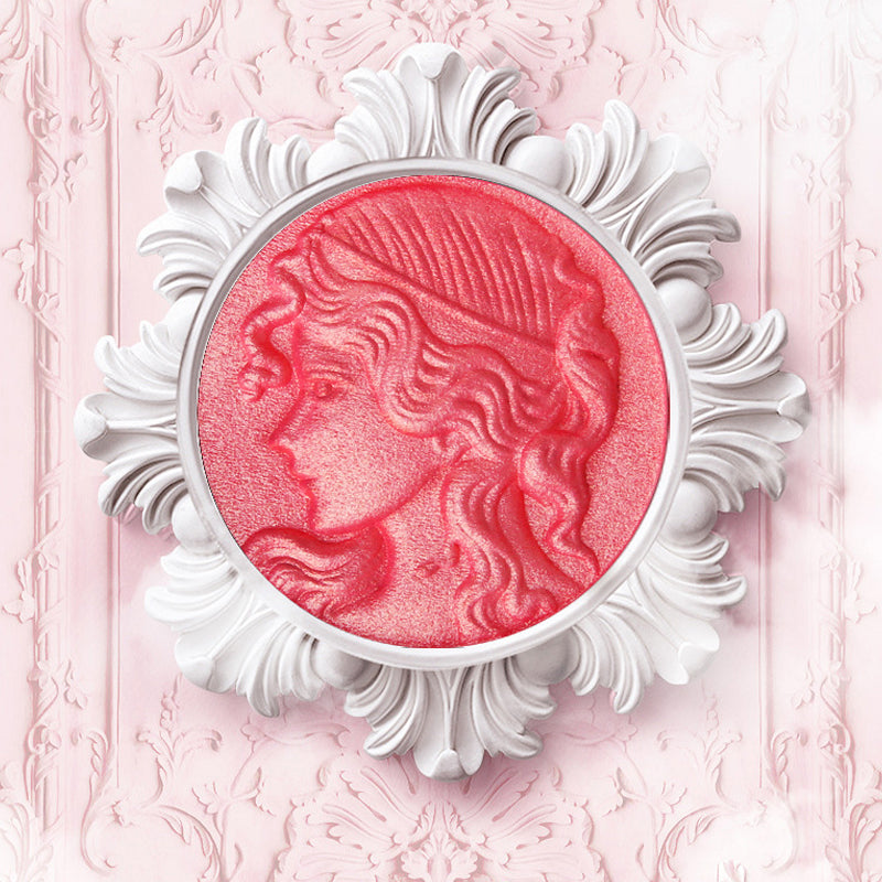 Präglad puderrougepalett med naturlig glöd, elegant design, subtil skimmer och nyanser rosa till apelsin för alla hudtoner.