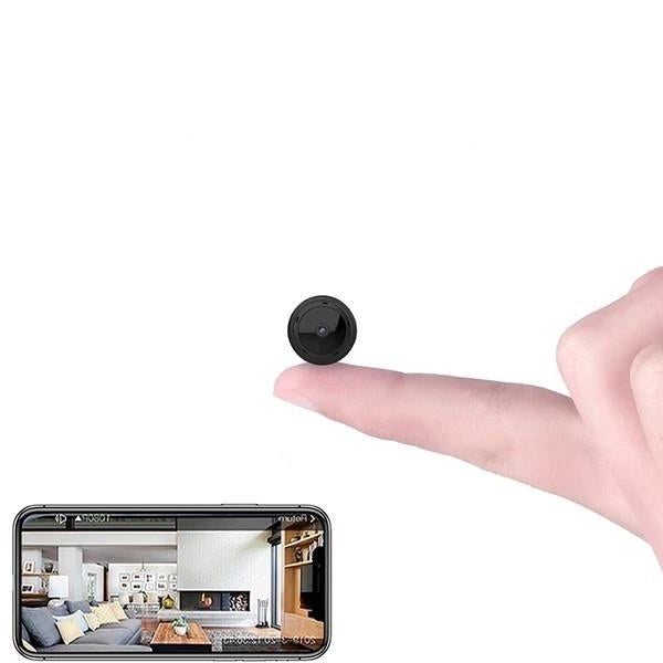 Mini WiFi-kamera som hålls på ett finger med mobilvisning