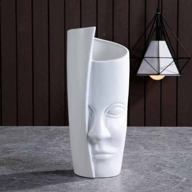 Modern blomkruka och vas med unik form