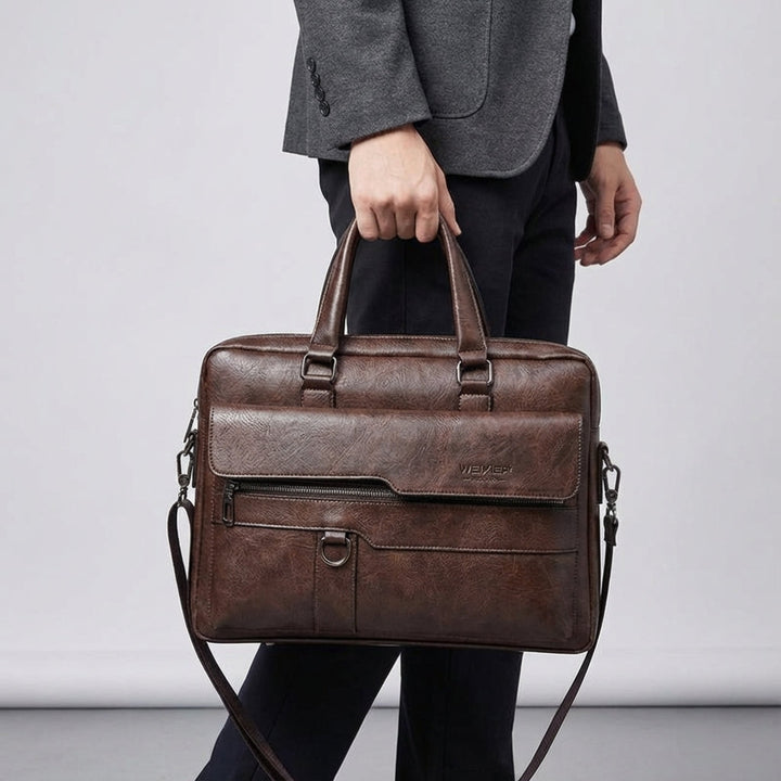 MetroBrief axelremsväska i PU-läder, perfekt som reseväska och professionell dokumentväska för laptop.