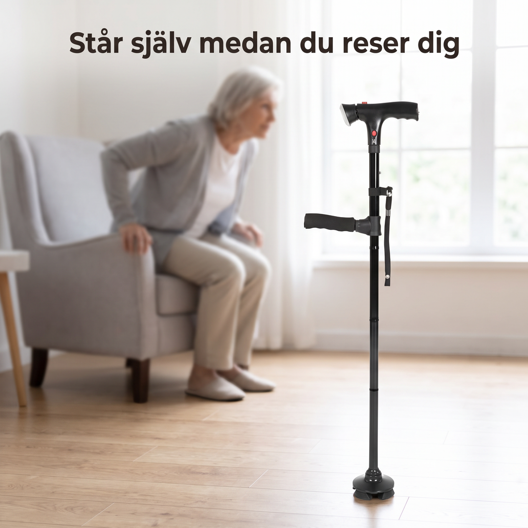 Självstående käpp placerad bredvid en fåtölj i ett vardagsrum