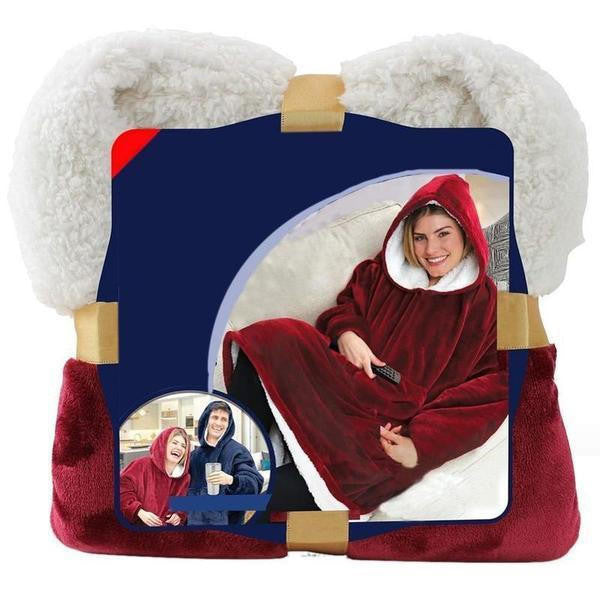 Person som bär blå oversized filttröja sittande i soffa