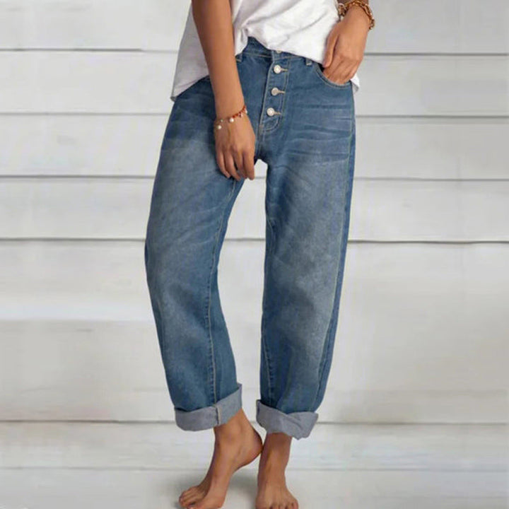 Raka damjeans med hög midja och blå tvätteffekt, tidlös design med rak passform.