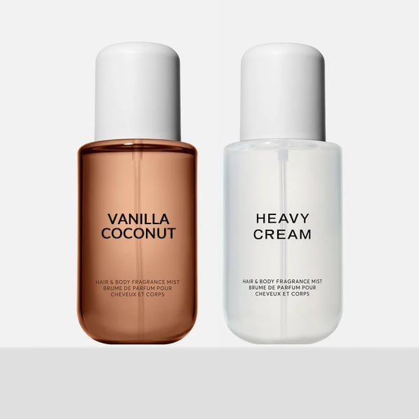 Vanilla coconut och heavy cream doftsprayflaskor stående upp