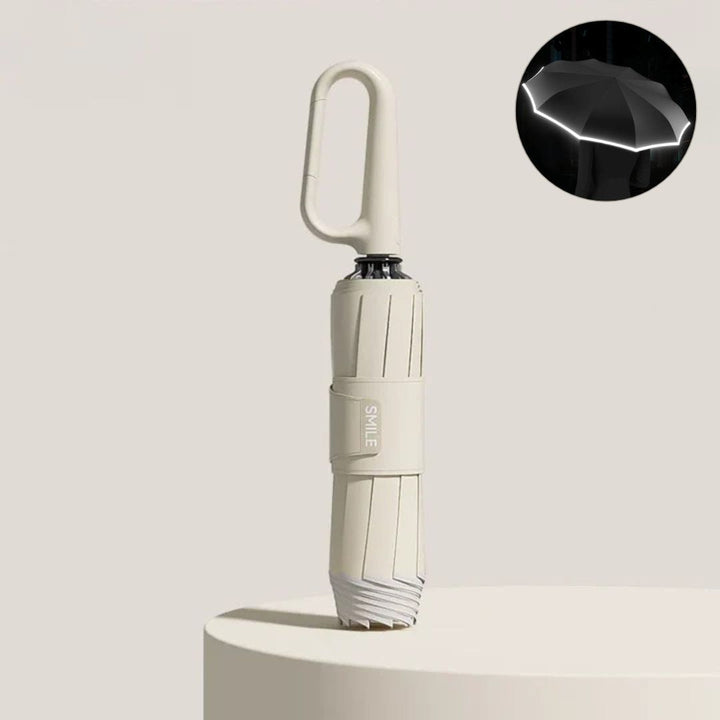 Ergonomiskt handtag på det vindtäta paraplyet för ett bekvämt grepp