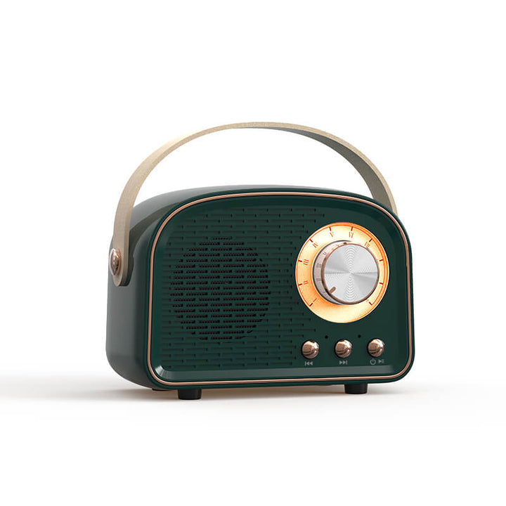 Presentförpackning bredvid trådlös retro högtalare som perfekt presenttips