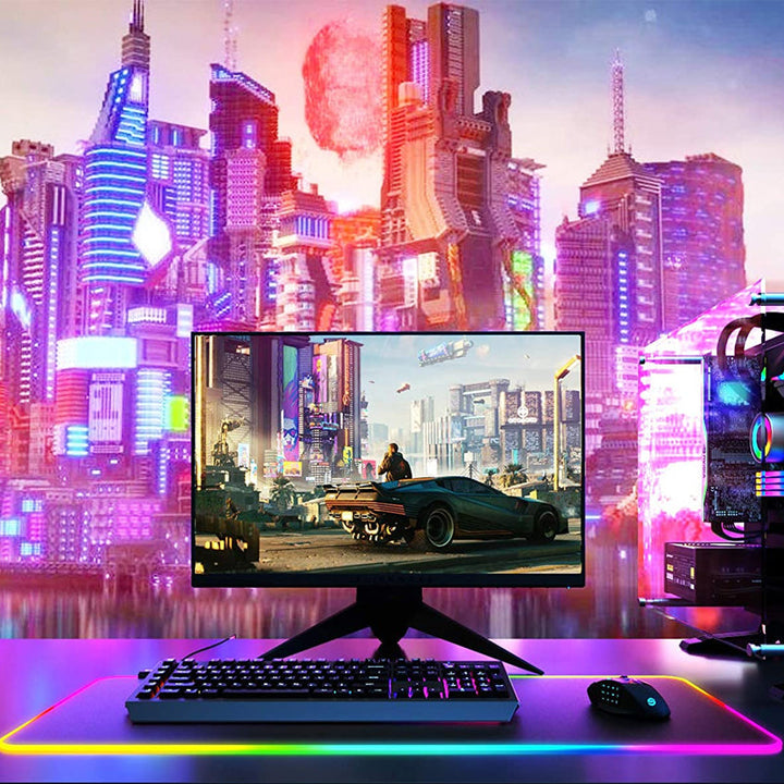 RGB gamingmusmatta med flerfärgat LED-ljus, sömlösa kanter, halkfritt gummiunderlag och dynamiska ljuseffekter.