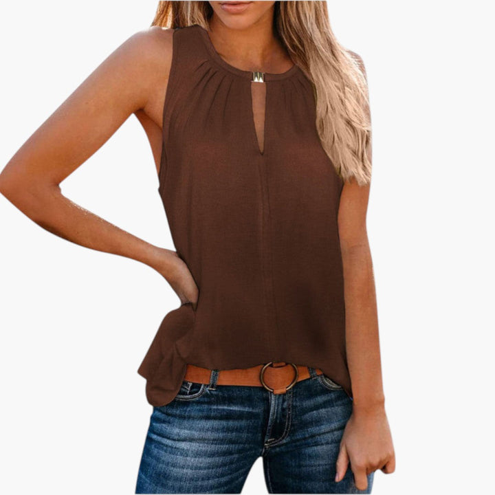 Luftig ärmlös sommarblus för damer, med veckad design och stilfull droppöppning. Casual & elegant.