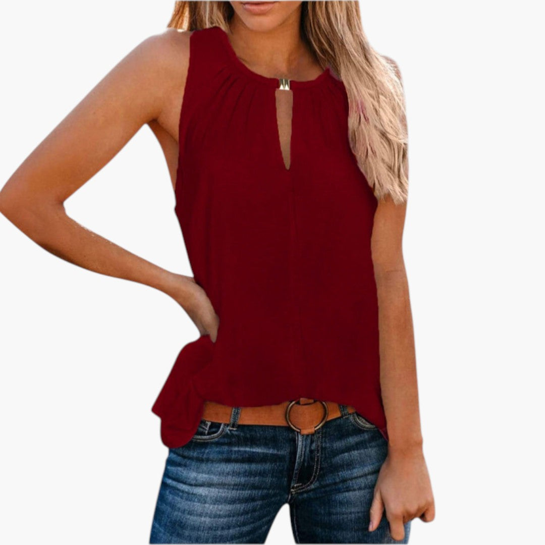 Snygg ärmlös blus för kvinnor, med elegant veckad front och modern droppöppning. Perfekt för jobbet.