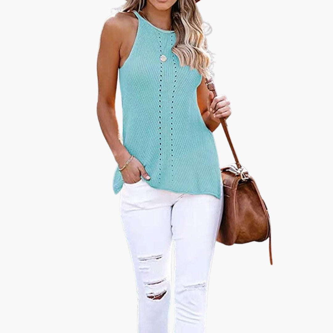 Enfärgad ärmlös damtopp i somrig stil, rundhalsad design för en chic och avslappnad look.