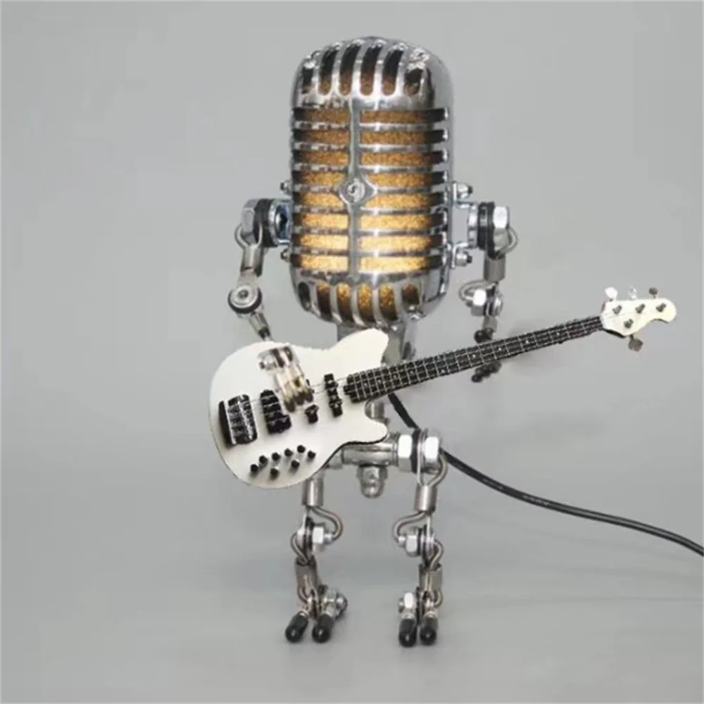 Detaljbild på robotbordslampa med gitarr och varm LED-belysning