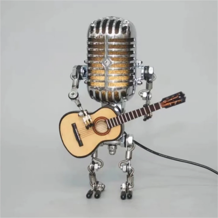 Unik industriell skrivbordslampa i form av robot med gitarr