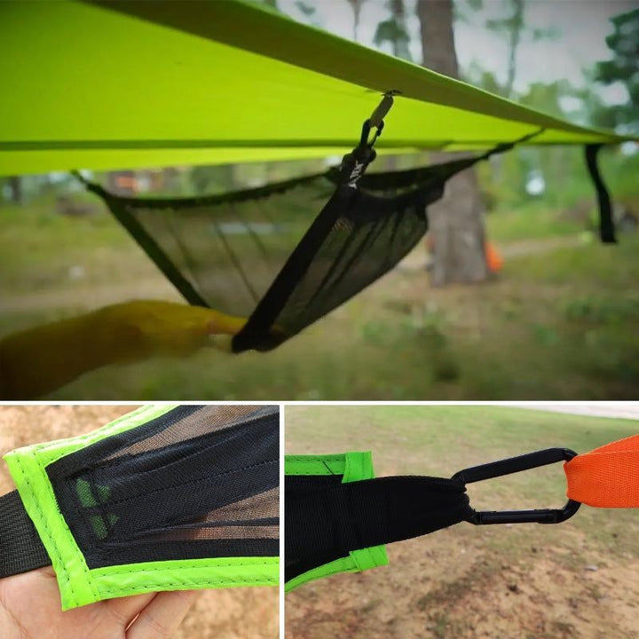 "Robust grön och svart nylonhängmatta för flera personer, perfekt för camping och utflykter, i naturlig miljö."