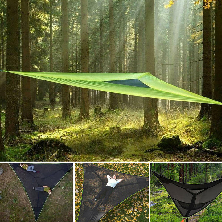 "Robust grön och svart nylonhängmatta för flera personer, perfekt för camping och utflykter, i naturlig miljö."