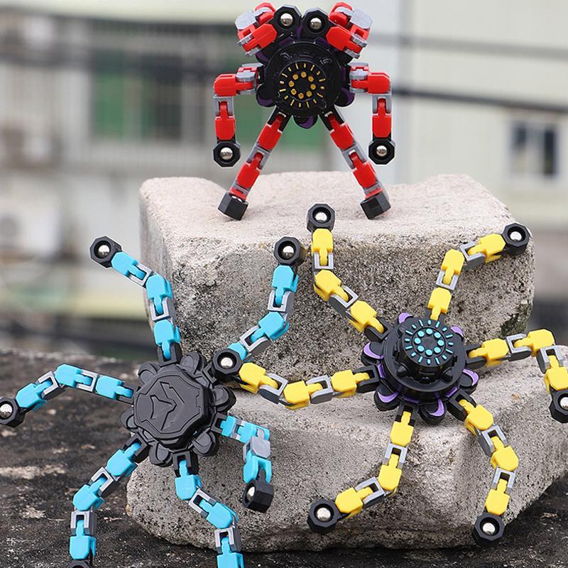 "Röd plast fidget spinner med sugkopp, färgglad och ergonomisk design för barn och vuxna, perfekt för stresslindring."