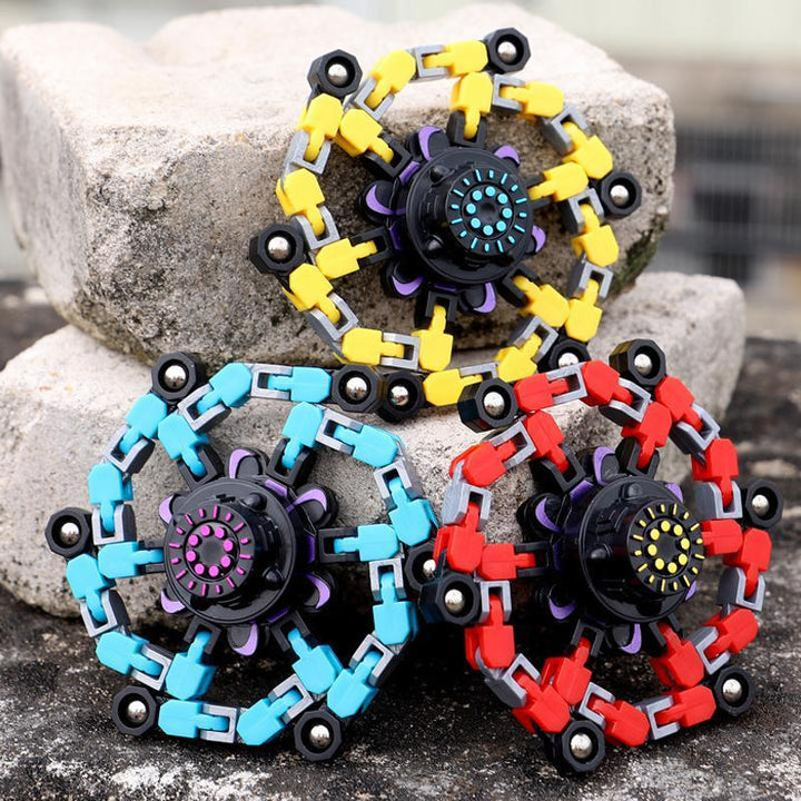 "Röd plast fidget spinner med sugkopp, färgglad och ergonomisk design för barn och vuxna, perfekt för stresslindring."