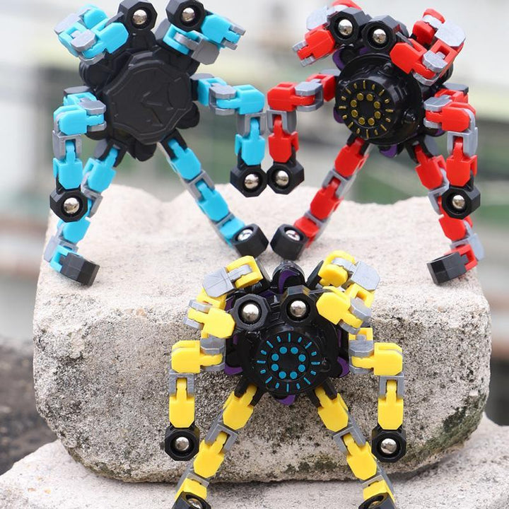 "Röd plast fidget spinner med sugkopp, färgglad och ergonomisk design för barn och vuxna, perfekt för stresslindring."
