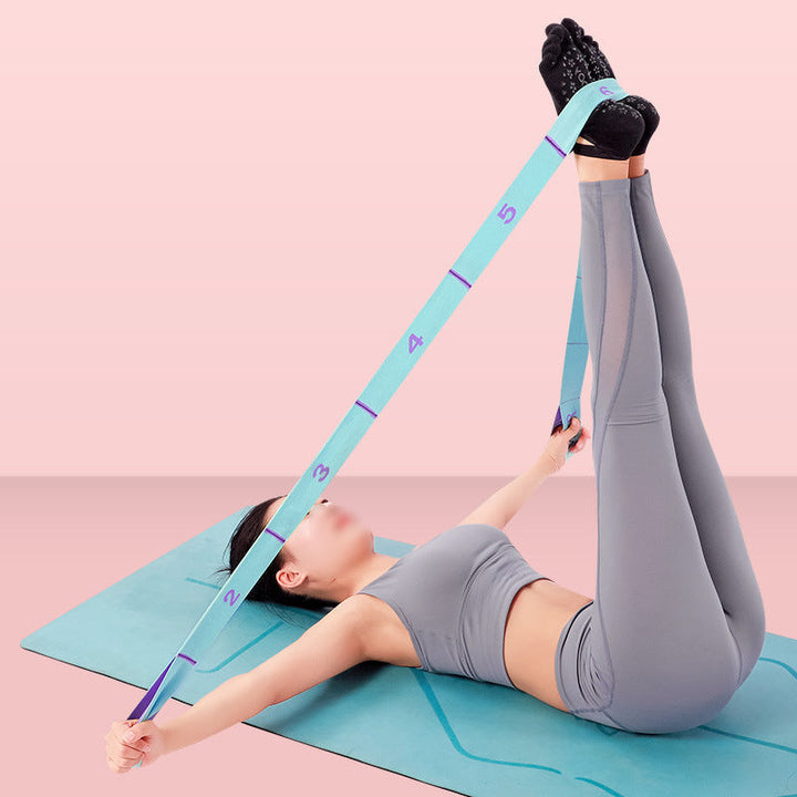 Rosa och blå träningsband för flexibilitet och motståndsträning.
