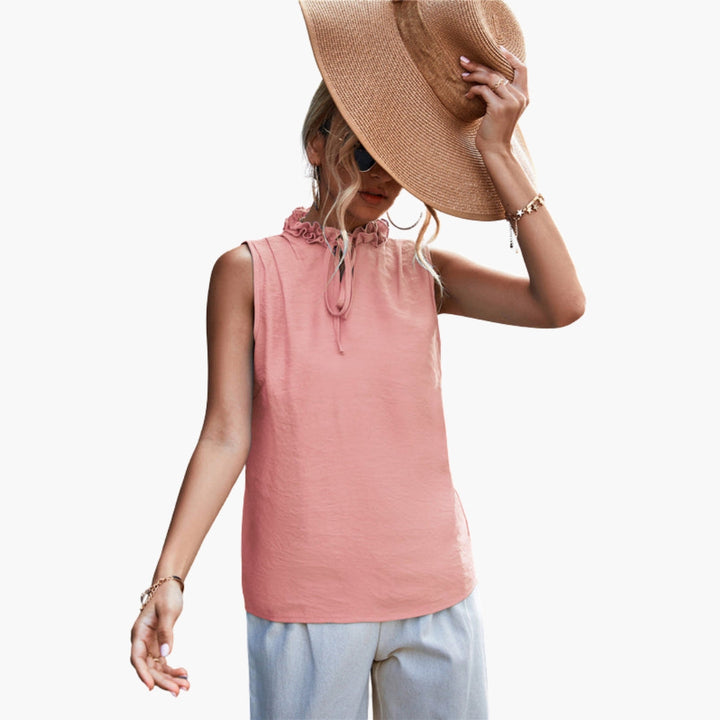 Rosa ärmlös topp för kvinnor med elegant volangkrage och justerbar knytning, perfekt för sommar.