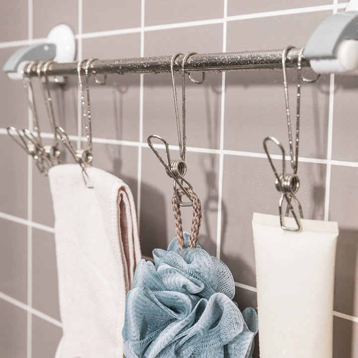 Rostfri metalklämma med lång svans, silverfärgad, perfekt för kök och badrum, hållbar design för smart förvaring.