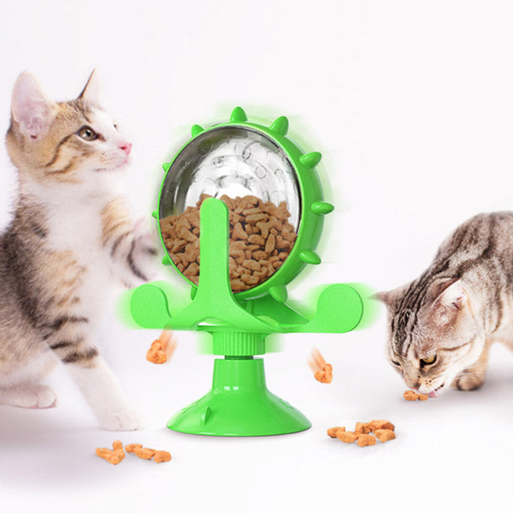 Roterande kattleksak med godisdispenser och sugkopp för interaktiv lek. Stimulerar kattungars sinnen.