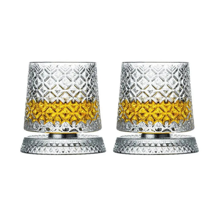 Set med två roterande whiskyglas i högkvalitativ kristall. Perfekt för drinkar.
