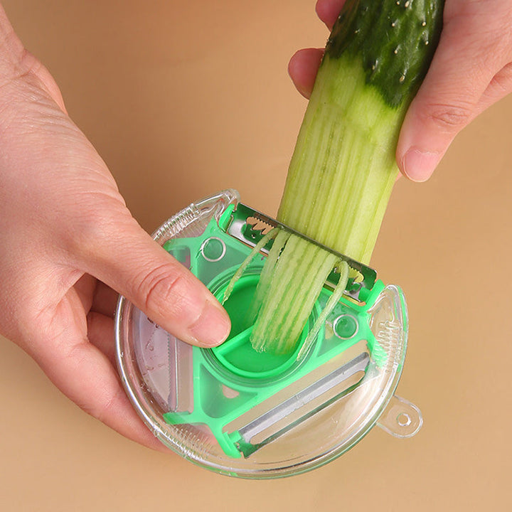 "Roterbar grönsaksskalare med 3 utbytbara blad, ergonomiskt handtag, rostfritt stål, för kök i färger röd, blå, grön."