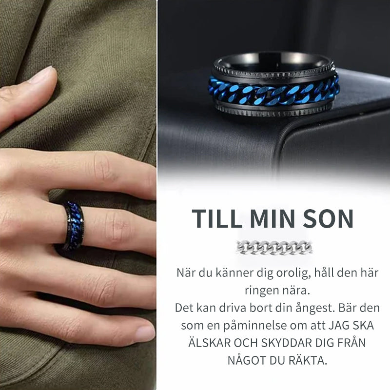 "Roterbar kedjering i rostfritt stål med geometriskt kedjemönster, finns i flera färger för både män och kvinnor."