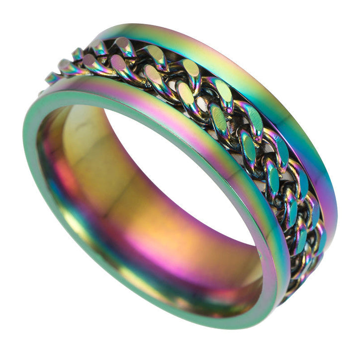 Roterbar unisex ring i titanstål, svart och stilren; elegant accessoar för modern och mångsidig stil.