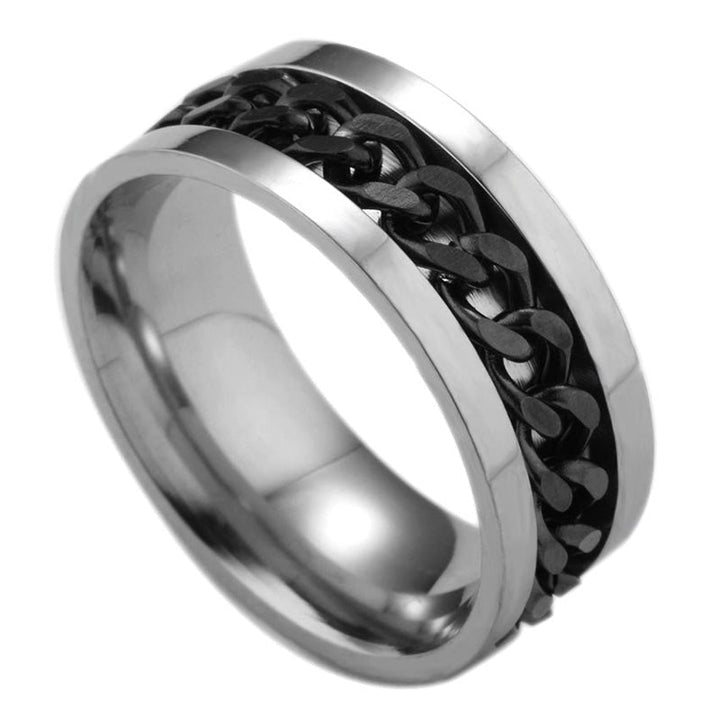 Roterbar unisex ring i titanstål, svart och stilren; elegant accessoar för modern och mångsidig stil.